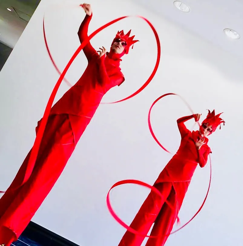Red Ribbon | Ribbon Twirling on Stilts